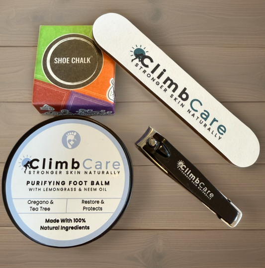 ClimbCare Foot Care Bundle featuring some foot balm, a shoe chalk block, some nail clippers and a skin file